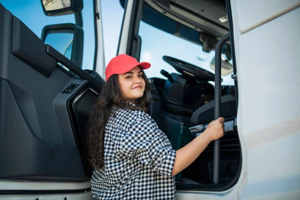 A Smiling Female Truck Driver